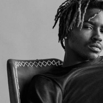 Black man modeling in a studio