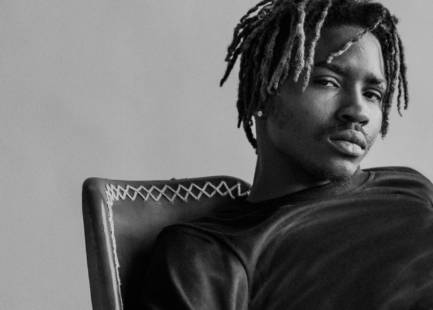 Black man modeling in a studio
