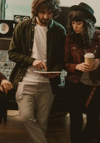 music band having conversation at sound recording studio music band having conversation at sound recording studio
