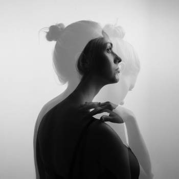 Creative double exposure portrait of a beautiful woman, monochro Creative double exposure portrait of a beautiful woman, monochro