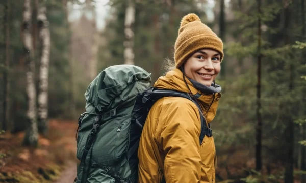 Cheerful Woman Hiking in the Forest